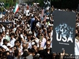 “Böyük Şeytan”ın bayrağı Tehran yürüşçülərinin inqilab qəzəbində yandırıldı