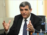 bir jurnalist və bir sayt məhkəməyə verilir